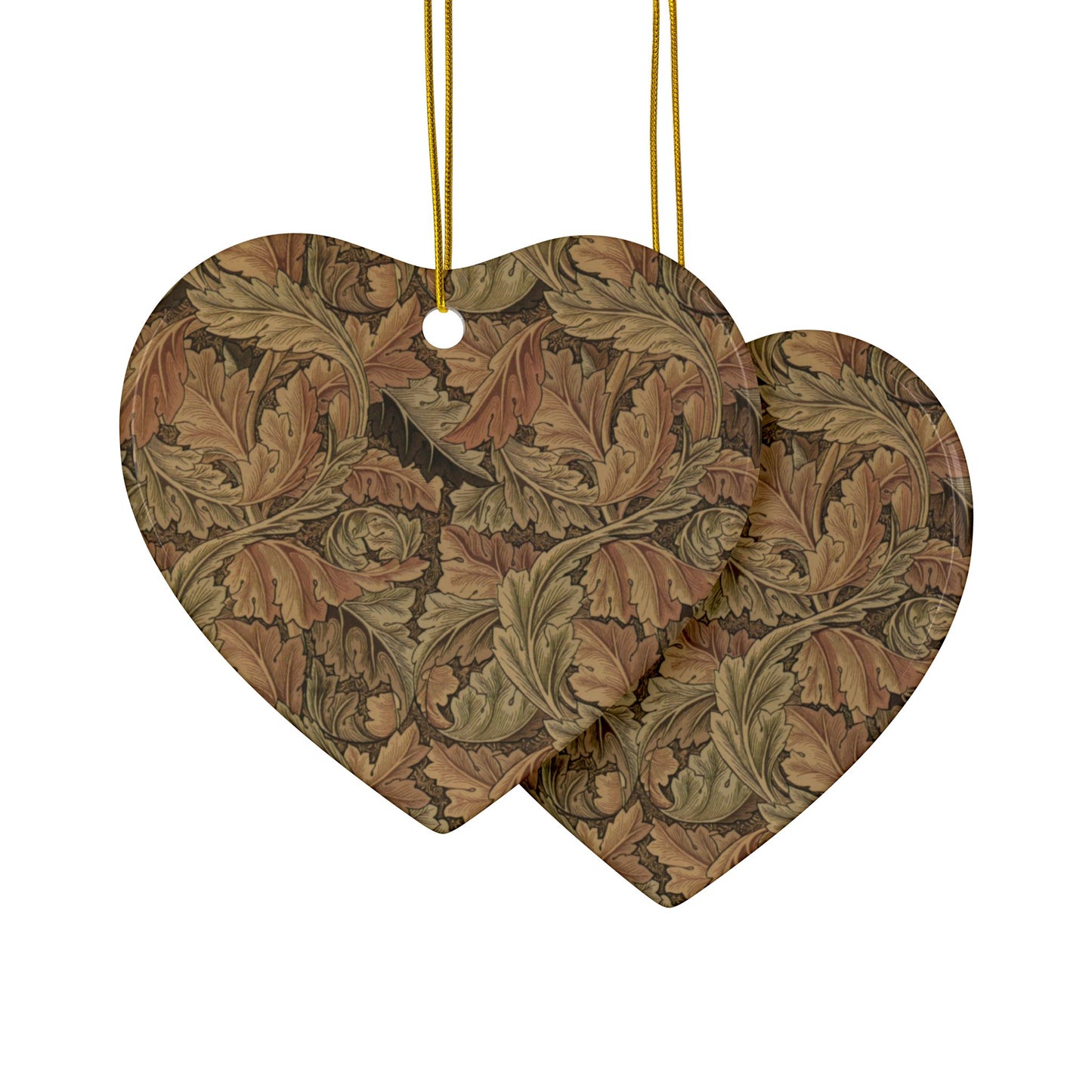 Two heart-shaped decorative items with leaf pattern on a white background