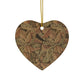 Heart-shaped decorative ornament with leaf pattern on a white background