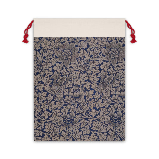 A beige linen drawstring bag with a floral pattern inspired by William Morris, featuring a red drawstring at the top.