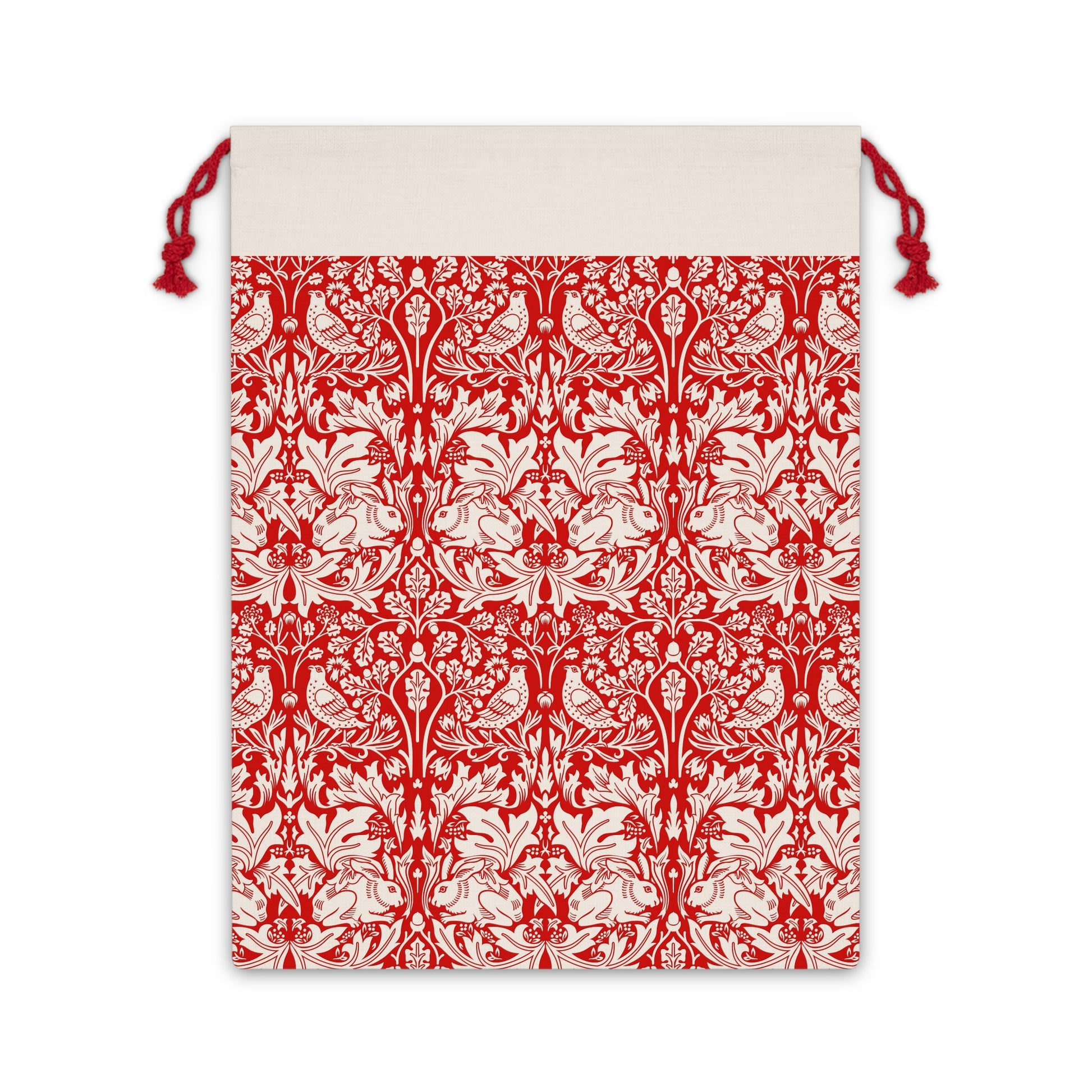 Christmas linen drawstring bag with red and white floral William Morris & Co pattern on a beige background