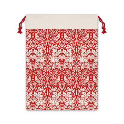 Christmas linen drawstring bag with red and white floral William Morris & Co pattern on a beige background