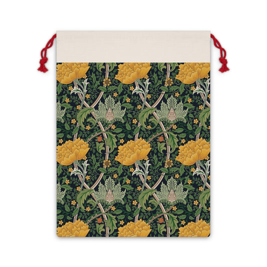 A rectangular Christmas-themed linen drawstring bag with a floral pattern primarily in yellow, green, and red colours, and a red drawstring at the top.