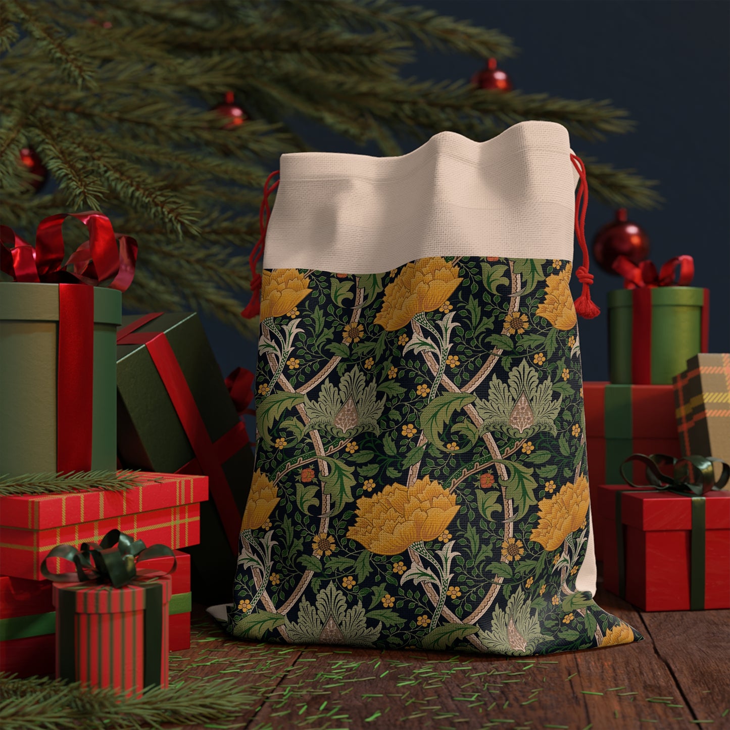 A rectangular Christmas-themed linen drawstring bag with a floral pattern primarily in yellow, green, and red colours, and a red drawstring at the top.