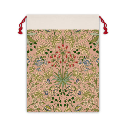 A rectangular Christmas Santa Sack with a floral pattern inspired by William Morris, in colors pink, green, and red, with a white top and red drawstrings.