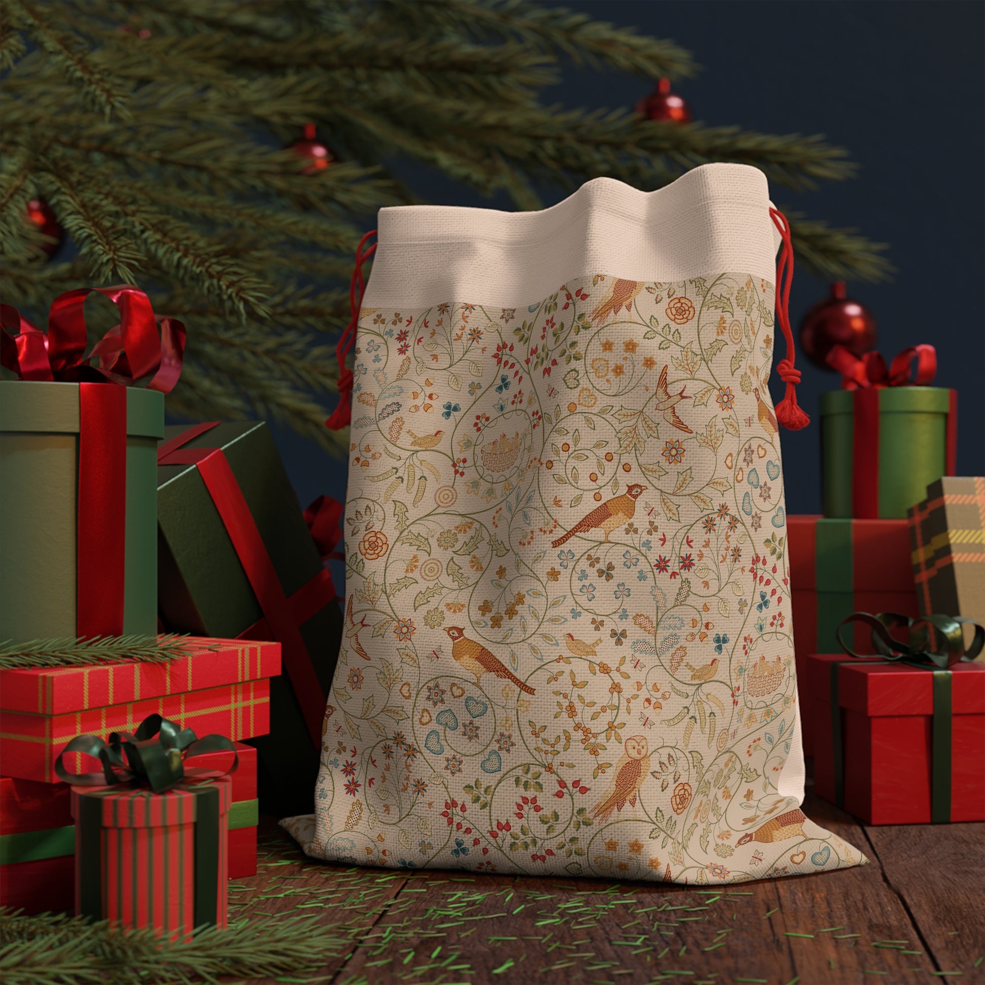 Decorative sack with bird pattern in front of Christmas presents and tree.