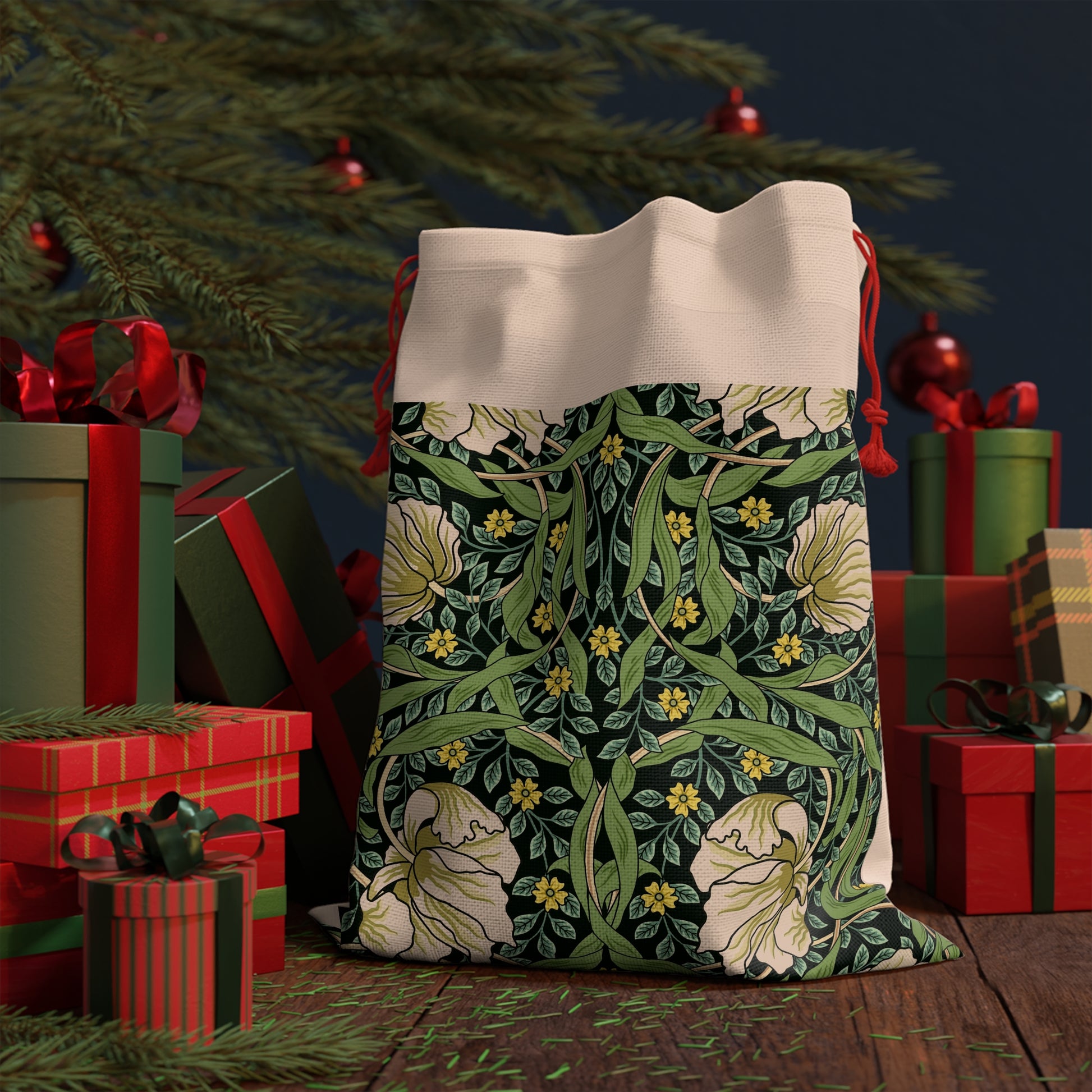 A rectangular Christmas Santa sack with a floral pattern inspired by William Morris - Pimpernel Collection in green, beige, and red colours with a red drawstring at the top.