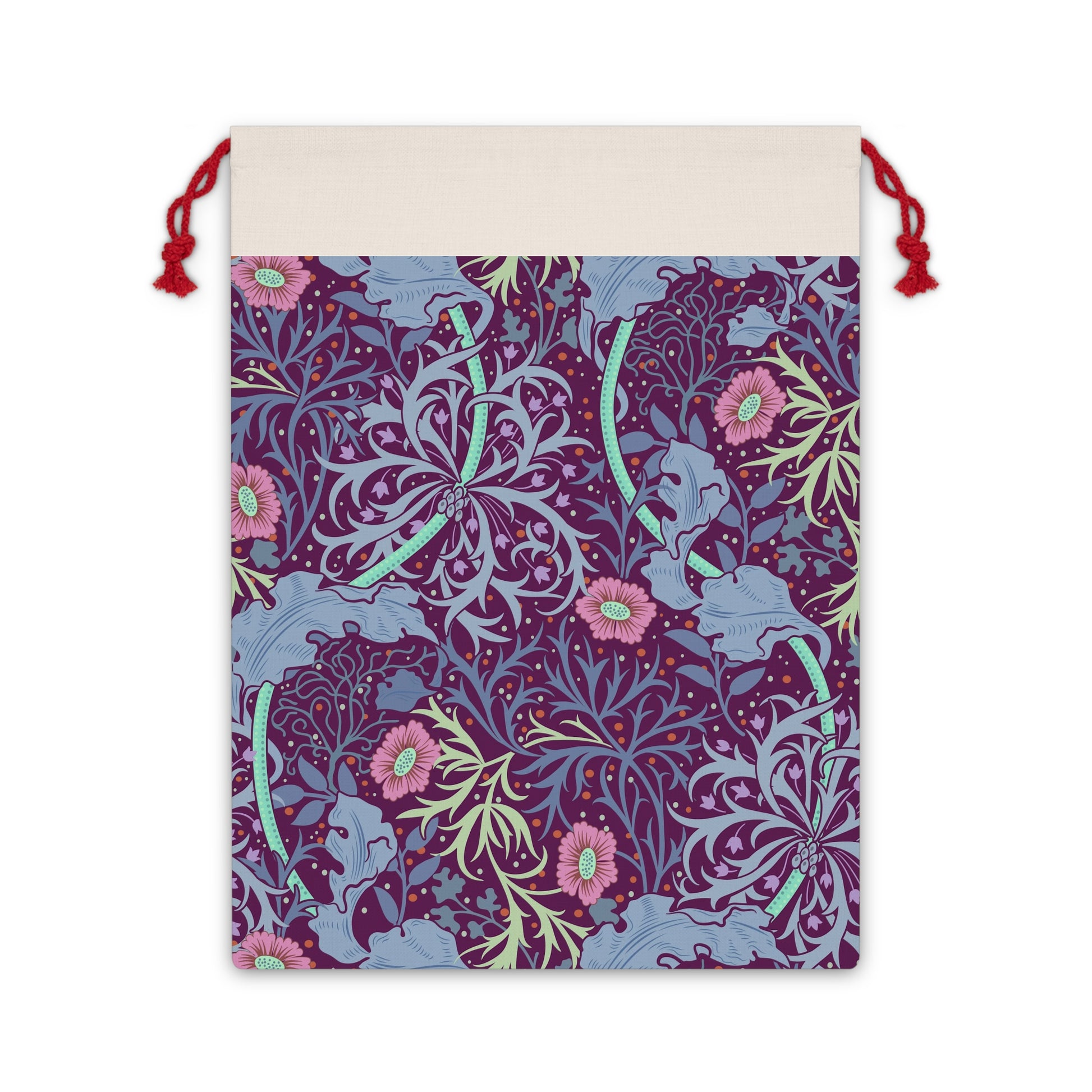 A rectangular Christmas-themed linen drawstring bag with a floral William Morris & Co pattern in pink and green on a beige background, and a red drawstring at the top.
