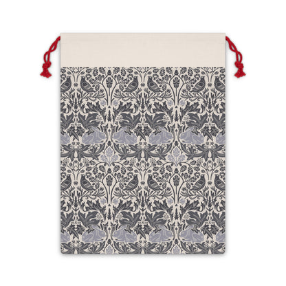 Drawstring bag with a gray and white floral pattern on a beige background