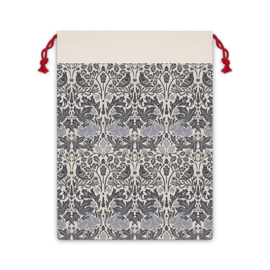 Drawstring bag with a gray and white floral pattern on a beige background