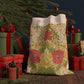 A beige Christmas Santa sack with a floral pattern inspired by William Morris - Honeysuckle Collection.