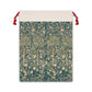 A Christmas Santa sack with a floral William Morris & Co pattern in green, beige, and gold colours, featuring a white drawstring and red ties.