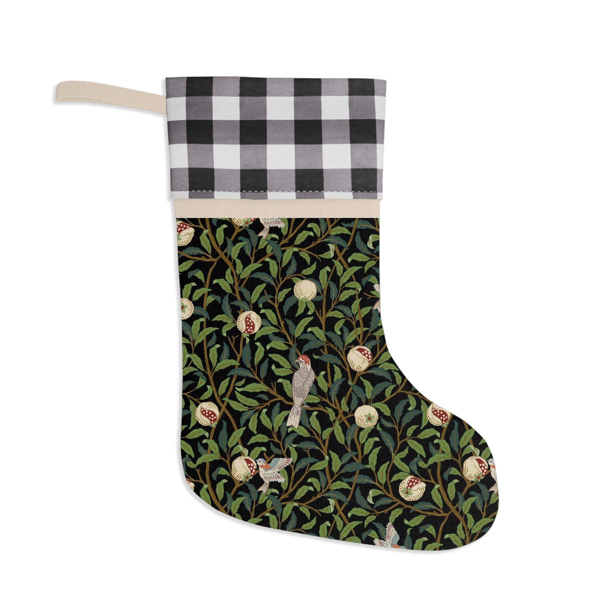 A Christmas stocking with a floral and bird design, featuring a black and white plaid pattern at the top and a wood loop for hanging.