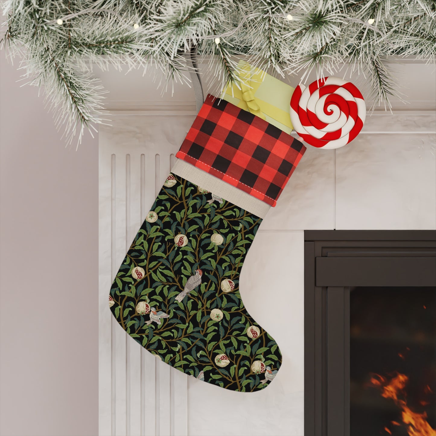 A Christmas stocking with a floral and bird design, featuring a black and white plaid pattern at the top and a wood loop for hanging.