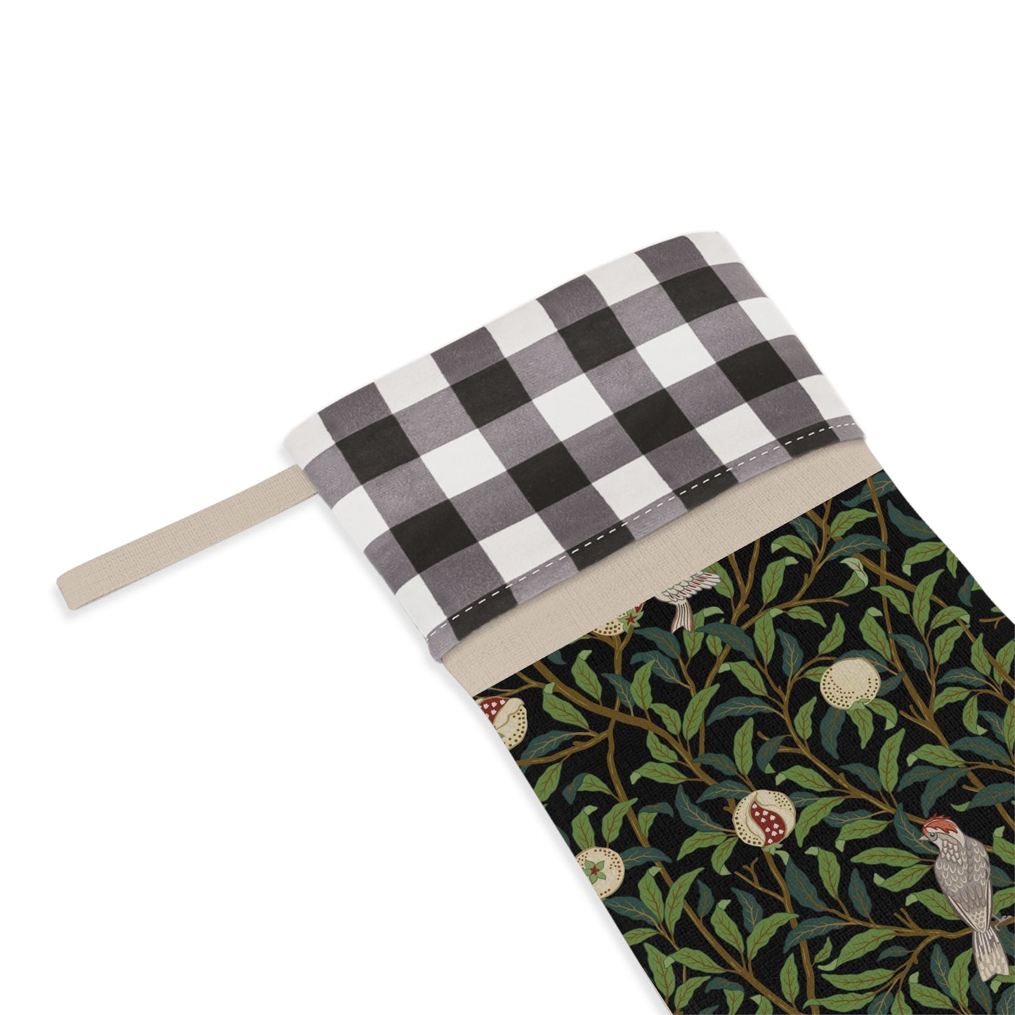 A Christmas stocking with a floral and bird design, featuring a black and white plaid pattern at the top and a wood loop for hanging.