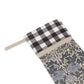 Fabric pouch with checkered top and nature-themed design on a white background