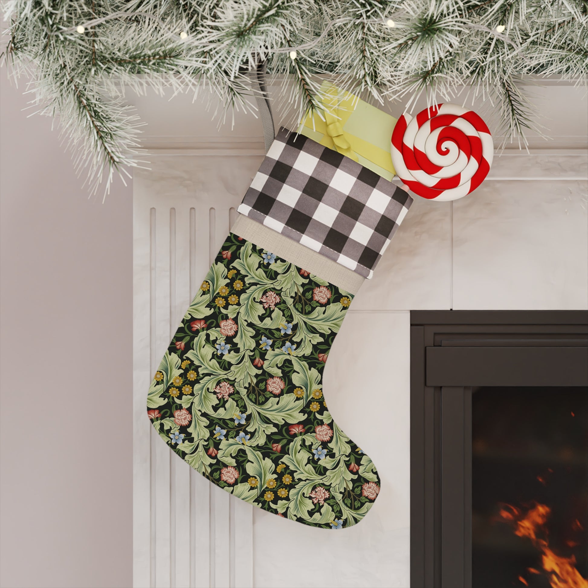 A one-sided printed Christmas stocking with a floral design, featuring a red and black plaid top cuff and a green body.