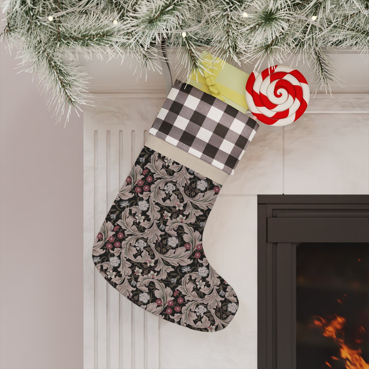 A Christmas stocking with a floral pattern in a red and black or white and black checkered design, featuring a wooden hanging loop.