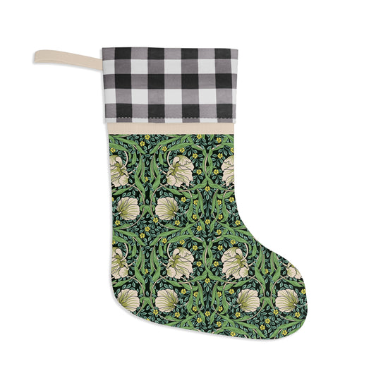 A one-sided print Christmas stocking with a floral pattern in green, black, and white colours, featuring a polyester plaid design on top cuff.