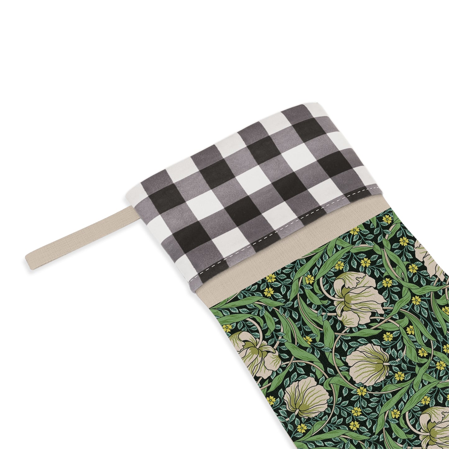 A one-sided print Christmas stocking with a floral pattern in green, black, and white colours, featuring a polyester plaid design on top cuff.