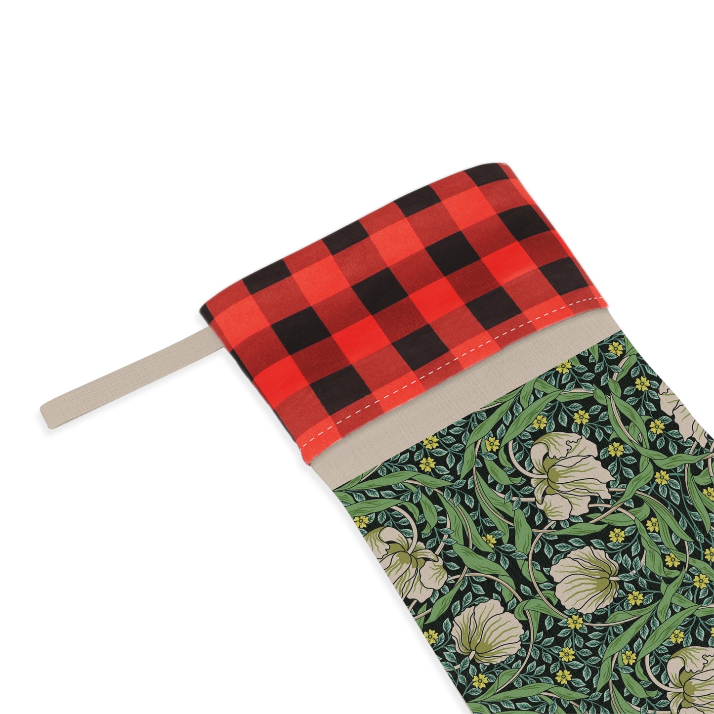 A one-sided print Christmas stocking with a floral pattern in green, black, and white colours, featuring a polyester plaid design on top cuff.