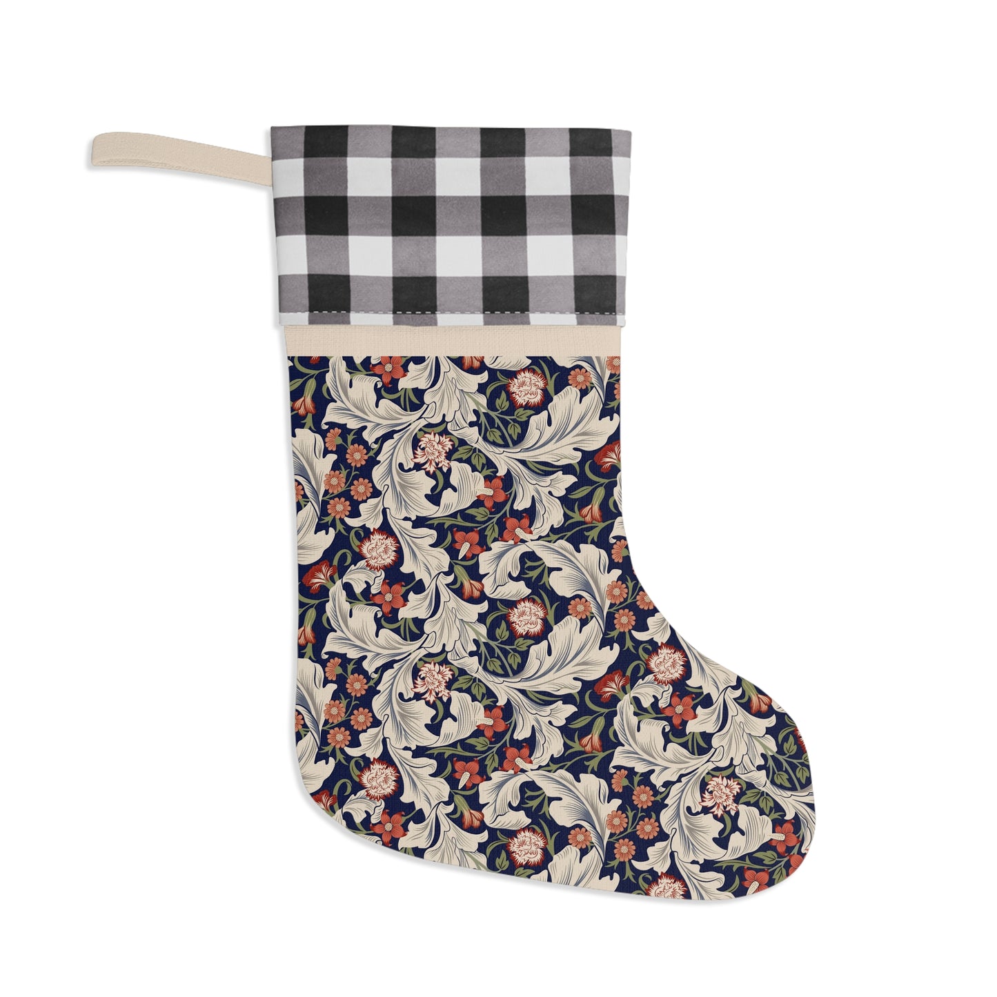 A Christmas stocking with a floral pattern in red, black, and white colours, featuring a plaid design on the top cuff.