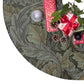 Decorative wreath with Christmas presents and ornaments on a green leafy background