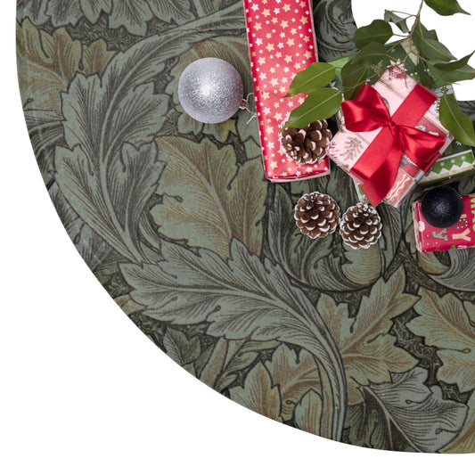 Decorative wreath with Christmas presents and ornaments on a green leafy background