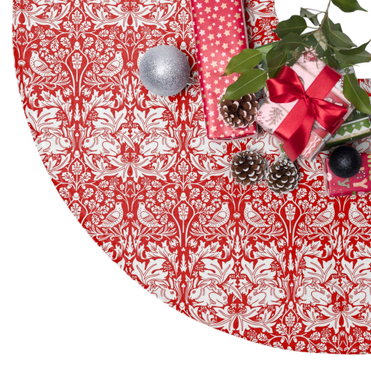 Decorative red and white patterned tablecloth with Christmas decorations on a white background