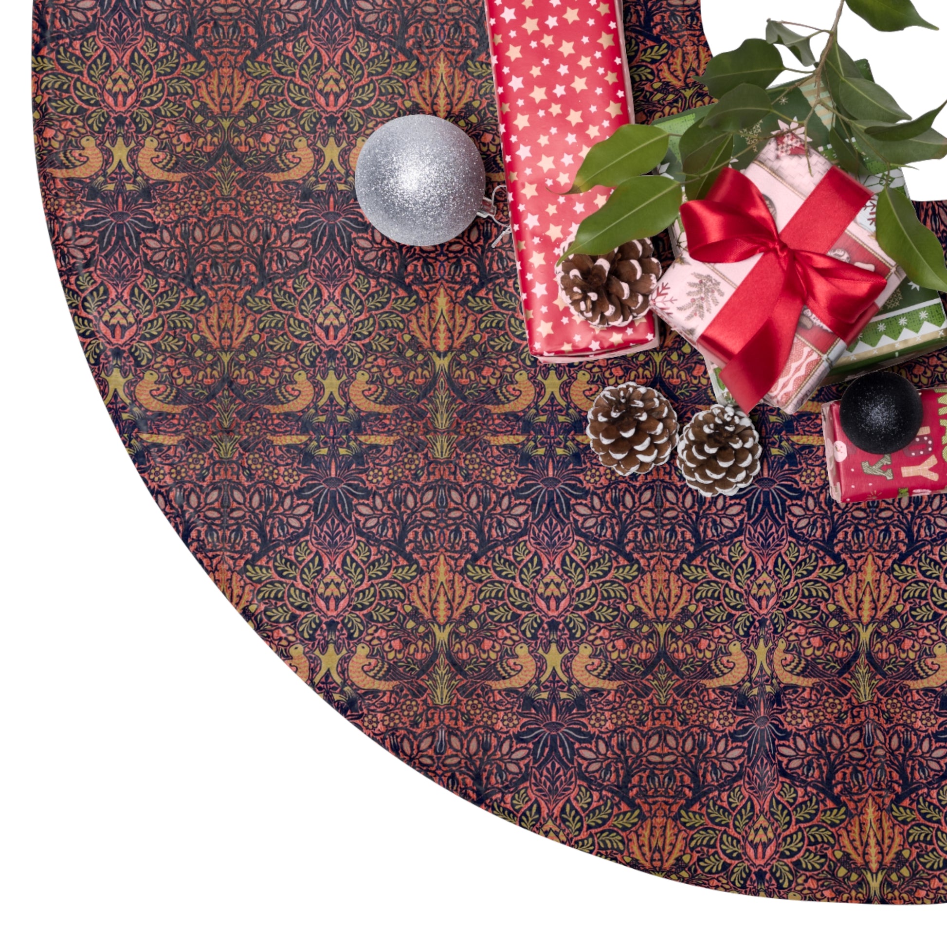 Decorative Christmas tree skirt with presents and ornaments on a white background
