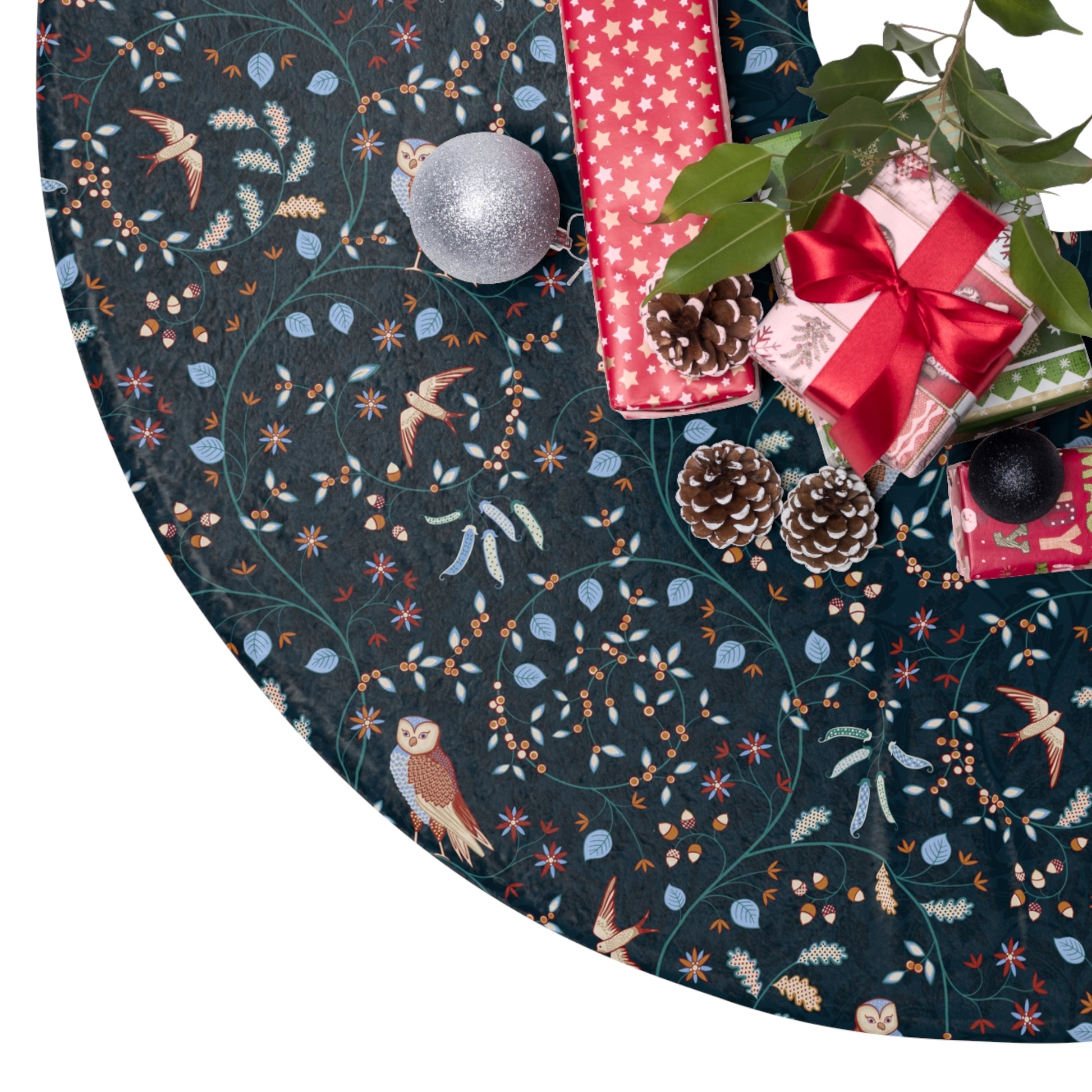 Decorative Christmas tree skirt with festive pattern and presents on a white background