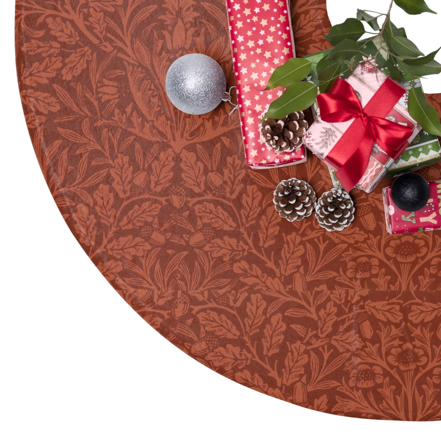 Christmas Tree Skirt by William Morris & Co in a pattern called Acorn & Oak Leaves Collection in a rusty red colour