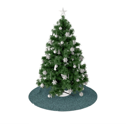 A round Christmas tree skirt with a teal base color, featuring a one-sided print of a Christmas tree with acorn and oak leaves design, inspired by William Morris.
