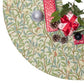 Christmas Tree Skirt by William Morris & Co in a floral pattern called Bird & Pomegranate Collection in colour parchment, brown, green and red
