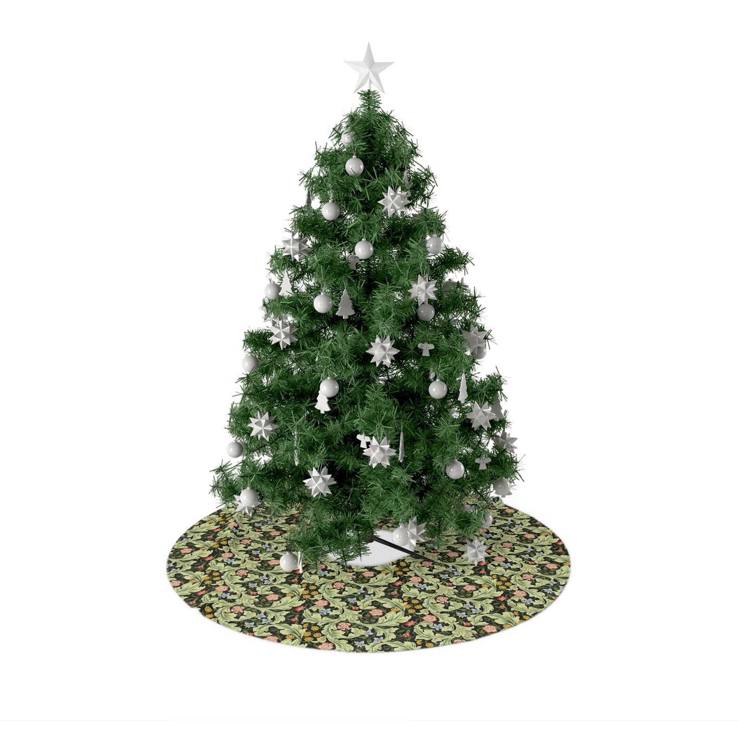 A green Christmas tree skirt with a floral pattern, placed under a artificial Christmas tree with a star at the top.