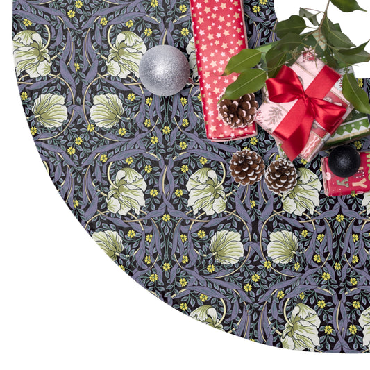 Decorative Christmas tree skirt with floral pattern and holiday elements.