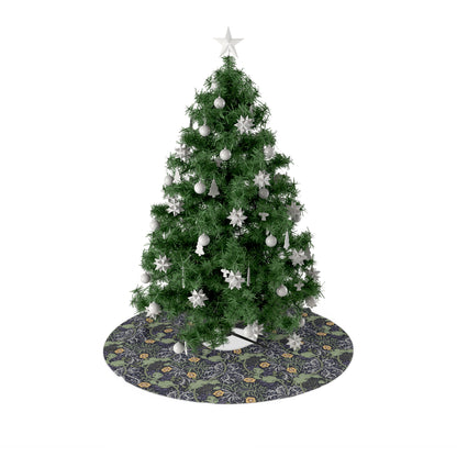 A Christmas tree skirt with a yellow floral pattern based on the William Morris design, displayed around the base of a Christmas tree.