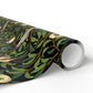 Roll of decorative paper with nature-themed design on a white background