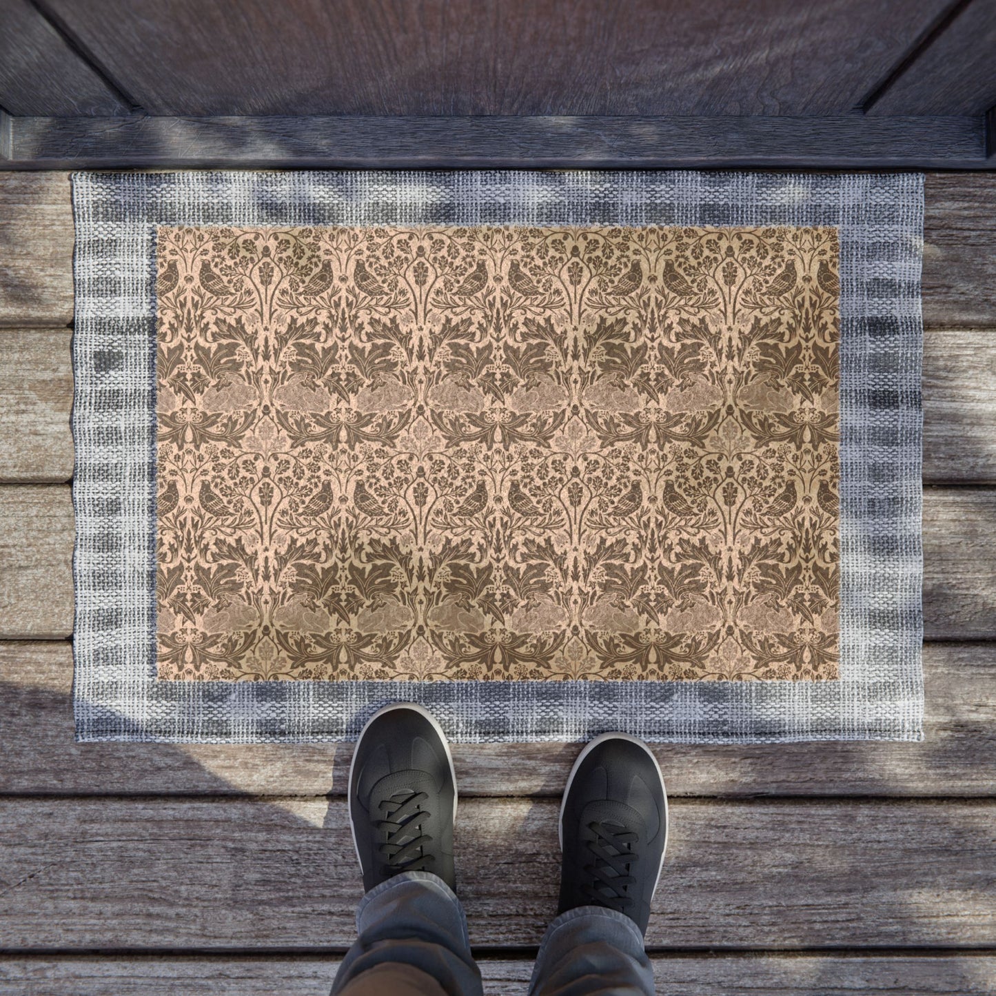 Patterned coconut coir hard wearing door mat with intricate floral and rabbit design from William Morris & Co 