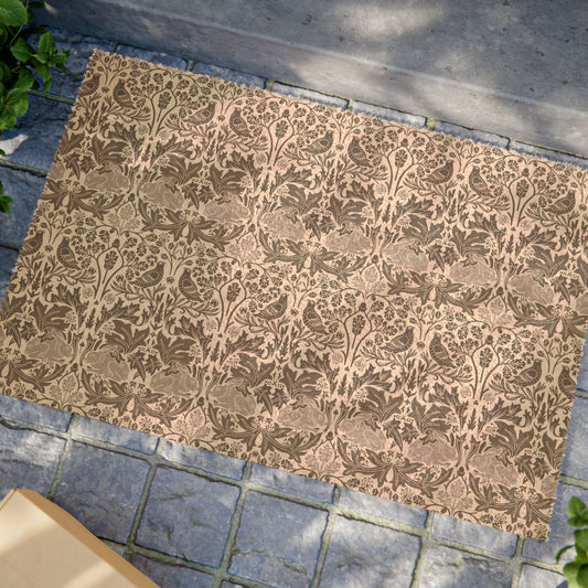 Patterned coconut coir hard wearing door mat with intricate floral and rabbit design from William Morris & Co 