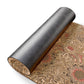 Coir mat with a metallic roll on a white background