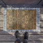 Decorative doormat with intricate patterns on a wooden floor