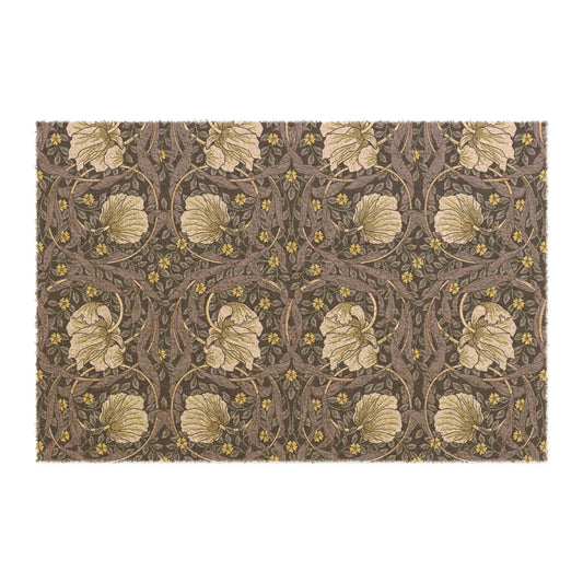 A rectangular coconut coir doormat with an intricate floral William Morris & Co pattern in shades of lavender and gold, with a black vinyl backing.
