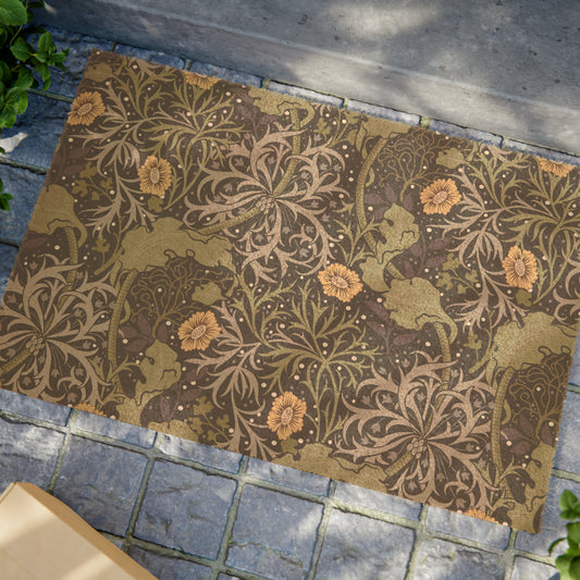 Rectangular doormat with a floral pattern in yellow and green floral shades by William Morris & Co, featuring a vinyl backing.