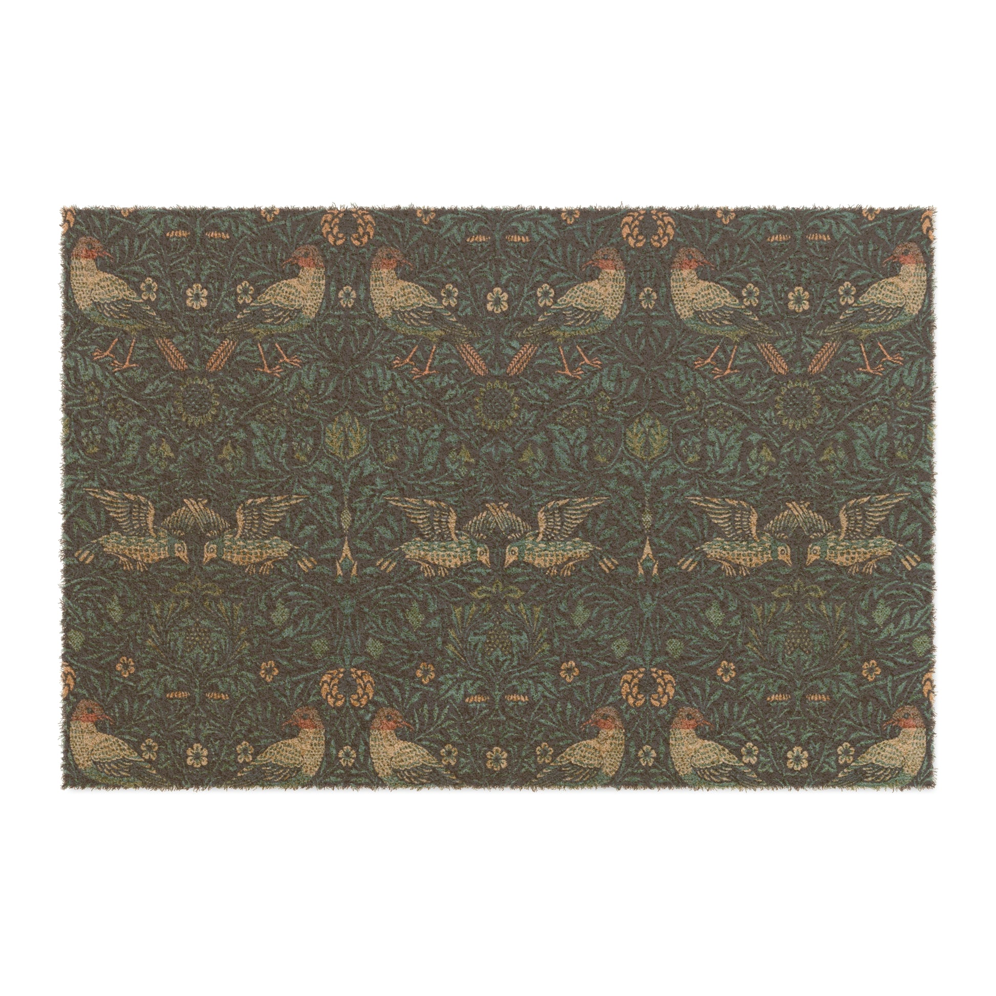 A rectangular coconut coir doormat with an intricate floral and animal pattern design, primarily in brown and green colours, with a black vinyl backing.