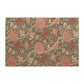 A rectangular area rug featuring a dense floral and botanical pattern with pink and red flowers, beige leaves, and a dark gray background, shown flat against a white backdrop.