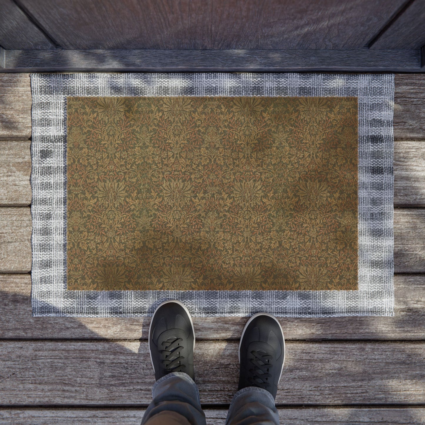 Rectangular coconut coir doormat with an intricate floral pattern inspired by William Morris.