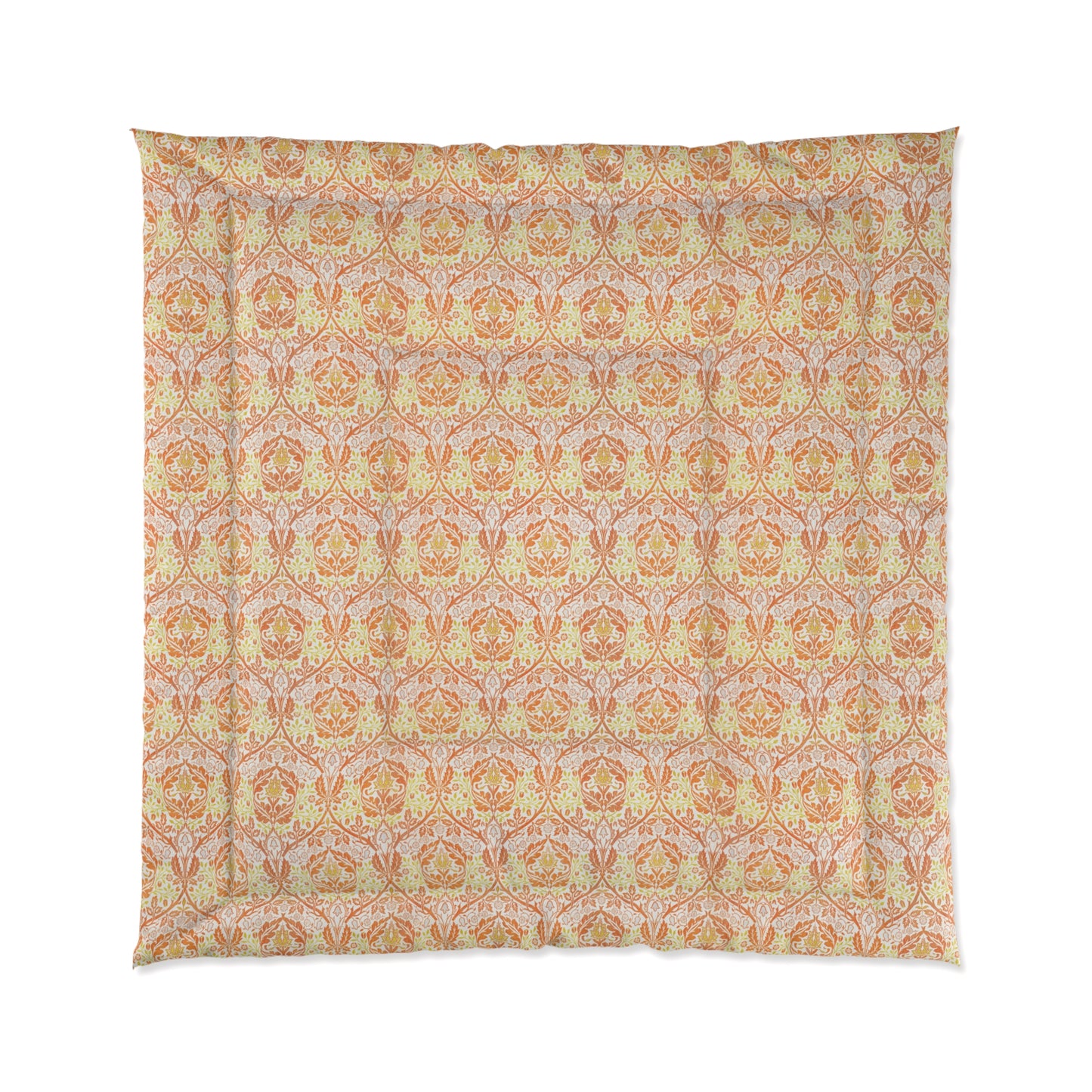 A comforter with a geometric William Morris & Co pattern called Golden Bough in shades of yellow, white, and orange.