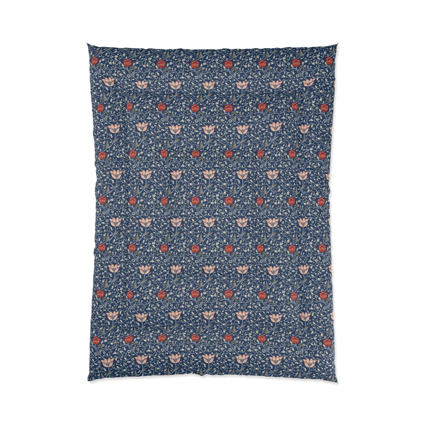 A square-shaped comforter with a blue background featuring a repeating William Morris & Co pattern of red and white apple designs and a plush batting layer visible on one side.