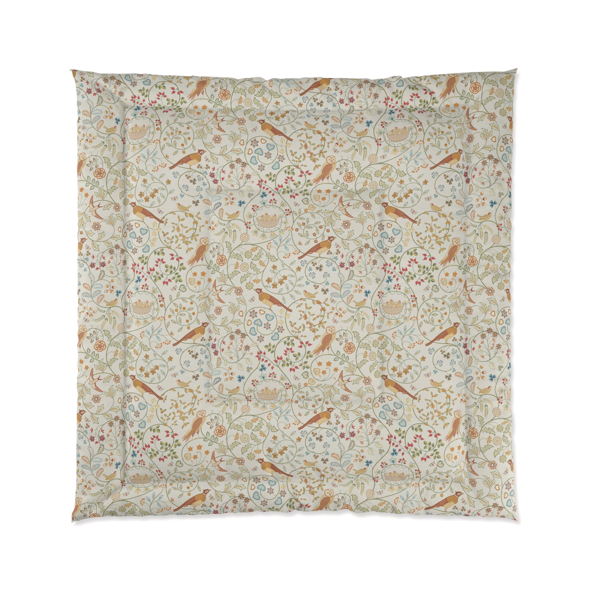 Floral and bird patterned fabric on a white background