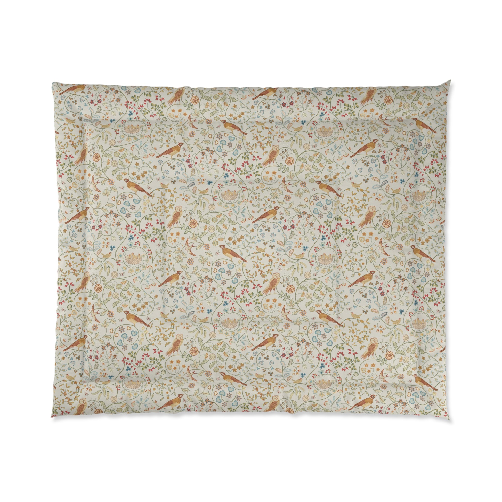 Floral and bird patterned fabric on a white background
